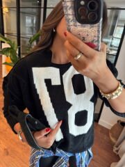 87 Siyah Kabartma Motifli Triko