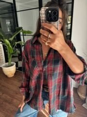 Eteği püsküllü ekose gömlek