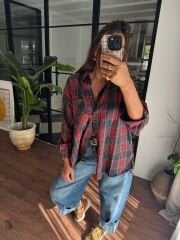 Eteği püsküllü ekose gömlek